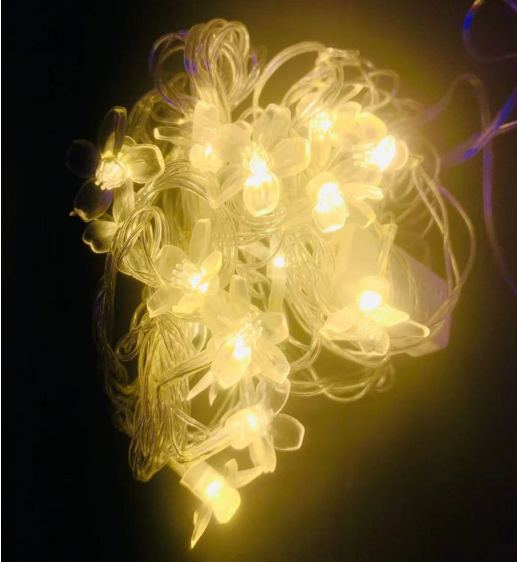 Luz navideña flor de cerezo